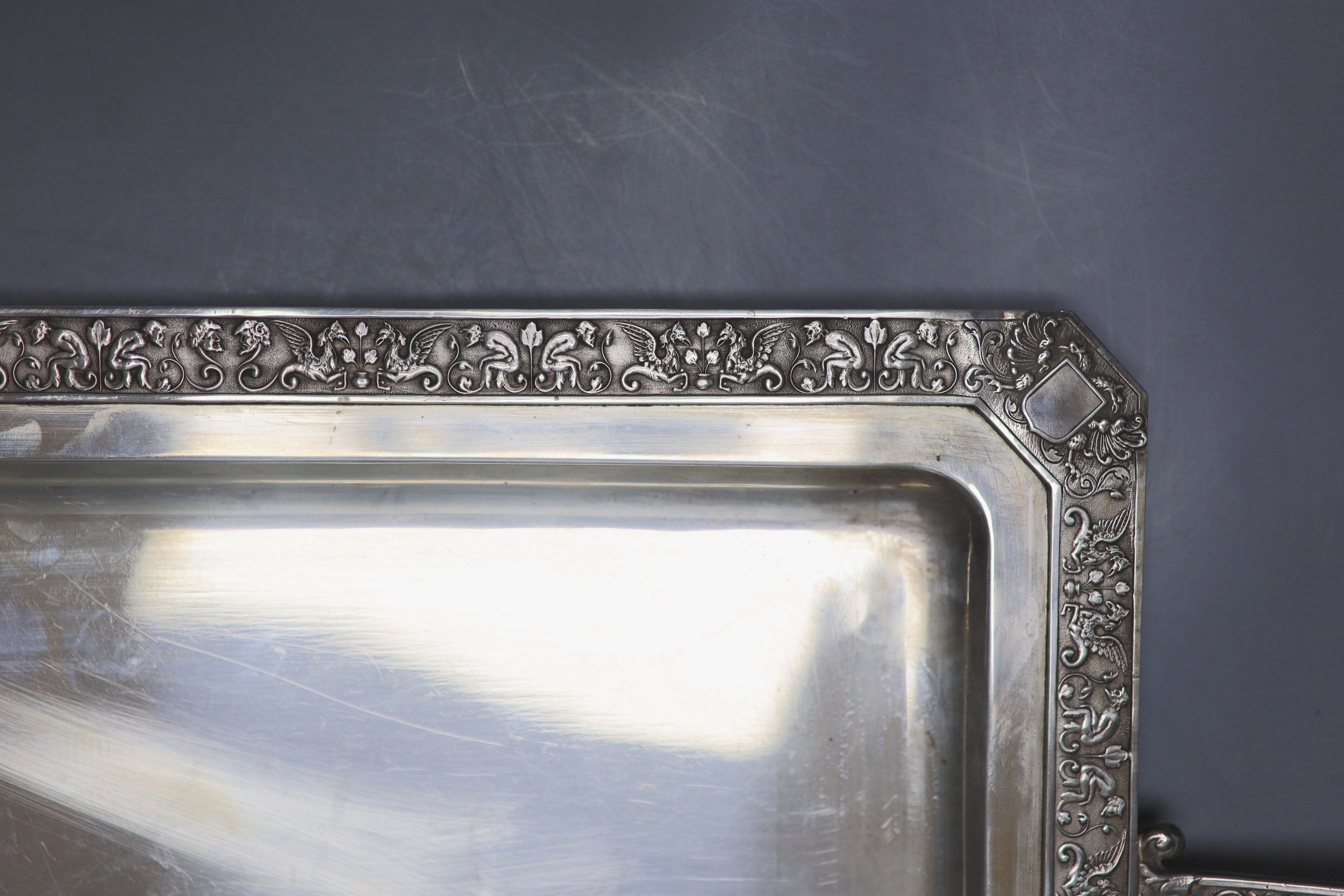 A continental white metal two handled tea tray, stamped Hernandez, 53.9cm over handles, 41.5oz.